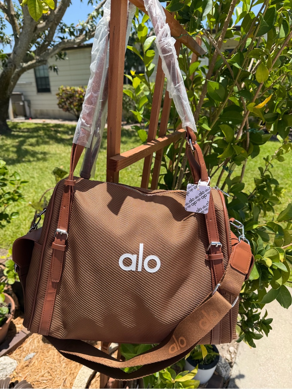 ALO Yoga Brown Duffel Bag with White Logo